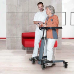 TOPRO Taurus E Premium Elektrisch, Handgriffe Verstellbar, Inklusive Handbremse, Armauflagen Verstellbar, Vorder- Und Hinterräder Arretierbar (Geradeauslauf), Bis 150 Kg -Coloplast Verkaufsgeschäft Taurus H Basic Gehwagen 01 3