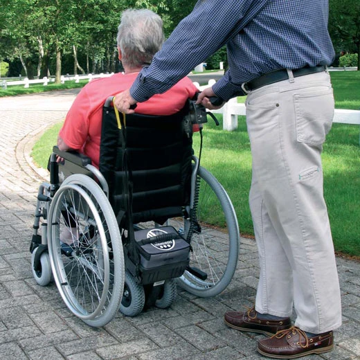 Schiebehilfe V-Drive Mit Rollstuhl D200V, HMV, Komplett Fertig Vormontiert, Elektromotor Mit Vermeiren Falt-Leicht-Rollstuhl, Akku + Ladegerät, Bis 115kg Personengewicht 5 Schiebehilfe V-Drive Mit Rollstuhl D200V, HMV, Komplett Fertig Vormontiert, Elektromotor Mit Vermeiren Falt-Leicht-Rollstuhl, Akku + Ladegerät, Bis 115kg Personengewicht – Bild 3