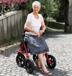 Dietz Taima XC Air Rollator Rot, Luftbereifung, Neues Modell, Leichtgewicht Nur 9,1 Kg, Bis 150kg Belastbar, Mit Gehstockhalter, Einkaufsnetz, Ankipphilfe, Reflektoren & Lenkungsdämpfer -Coloplast Verkaufsgeschäft Wanderrollator 6