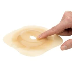 Dansac Nova 2 Basisplatte, Ringgröße: Ø 55 Mm; Plattengröße: 115x115 Mm, Ø 35 Mm. -Coloplast Verkaufsgeschäft dan 1555 15 nova 2 convex wafer hand 0081 1